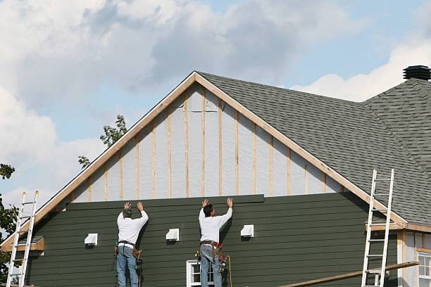 Professional Storm Damage Siding Repair technician working in Saltsburg, PA